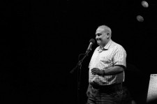 Robert performing at "the Moth"