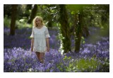 Model walking through a field of Bluebells