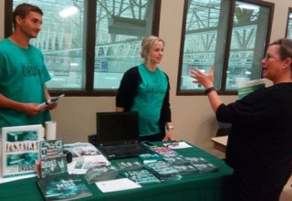 Scientologists set up booths at conferences to promote drug education as essential to preventing drug abuse.