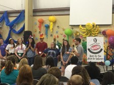 Dillon Ivy of Presenting Awards to Volunteers