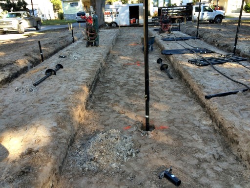 Pre-Fabricated Structure Rests on New Foundation Supported by Steel Piles