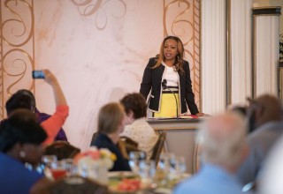 Esther Fife of Operation HOPE briefed those attending on her organization's programs to empower people through financial literacy. 