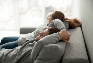 Couple Sitting on a Couch Together