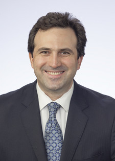 Mario E. de la Garza, founding partner of The de la Garza Law Group