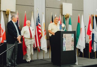 Ted Durig accepts award