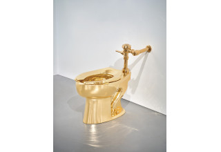 Solid Gold Toilet by Maurizio Cattelan