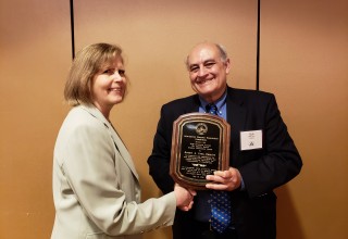 Mary Kate Coleman presents Robert A. Creo, Esq with the Sir Francis Bacon Award