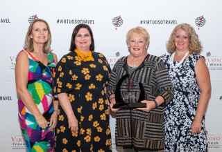Travel Experts' Management Team Accepts 2019 Top Virtuoso Air Production Award