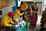 Pakistan Volunteer Assist Team providing medical care in remote village, stranded by the earthquake. 