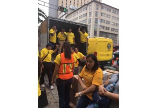 Around the clock, as supplies come in to the Church of Scientology, volunteers package them up for distribution and trucks load up and ferry them to the Volunteer Ministers tents where people can come get what they need.