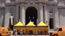 Scientology Volunteer Ministers set up their bright yellow tent at City Hall. 