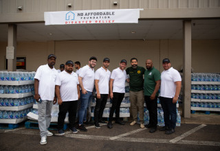 Jackon Mayor Chokwe Antar Lumumba with the NB Affordable Team