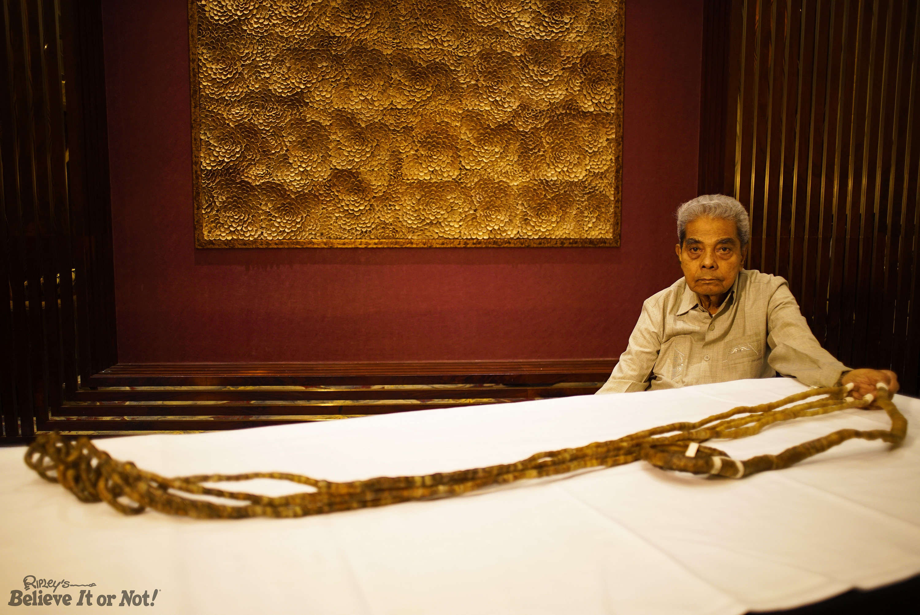 Woman with 42-feet-long fingernails scores world record