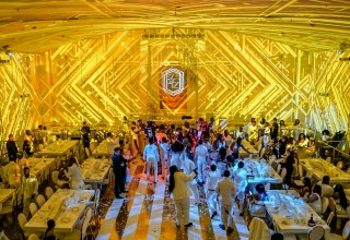 220 guests dancing.