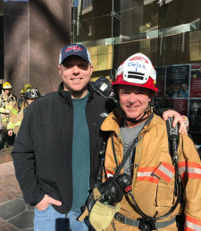 Founder Dan McBride with Father Rick McBride