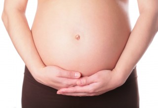 Pregnant Woman Holding Belly