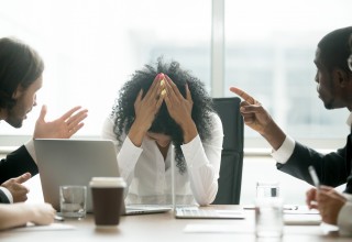 Upset Woman in Office Setting