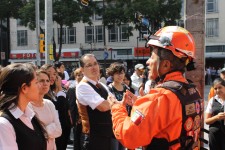 Los Topos founder and president Héctor Méndez briefs the staff and parishioners of the National Scientology Organization of Mexico on what they should do in the event of natural disaster