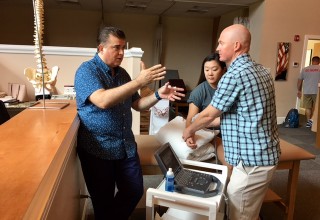 Dr, Kostopoulos & Dr. Cochran demonstrating Diagnostics to Physical Therapists