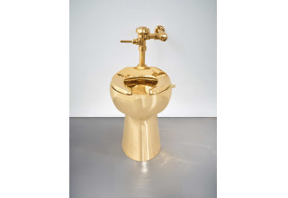 Solid Gold Toilet by Maurizio Cattelan