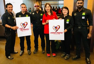 Minister Teresa Kok with members of Sabah's Wildlife Rescue Unit