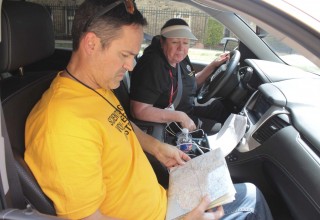 Volunteer Ministers team leader Joava Good behind the wheel of the van. They are providing disaster relief to the people of the city.